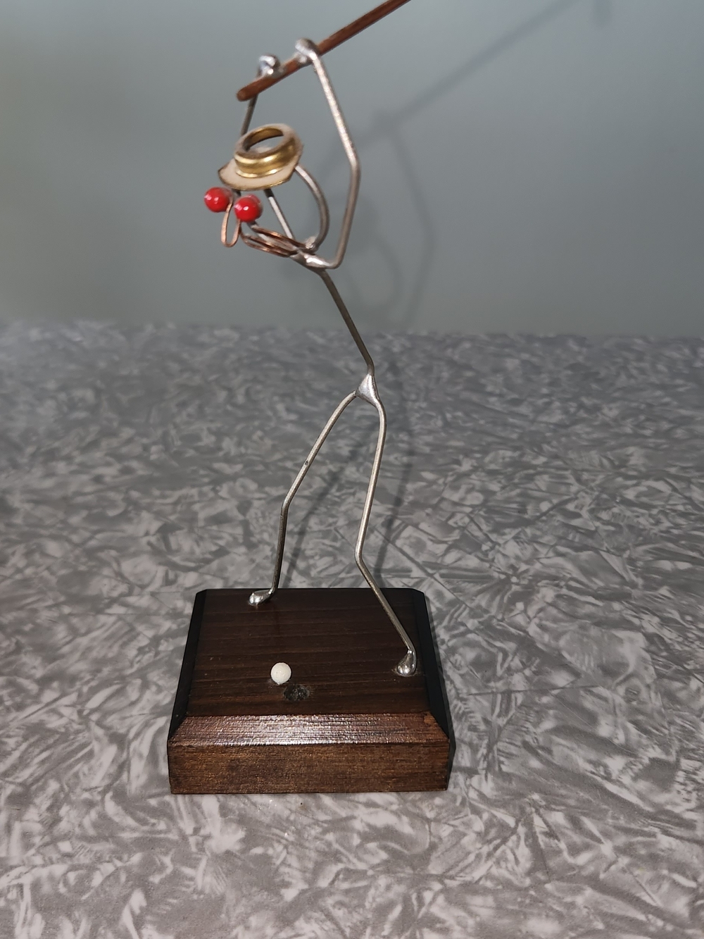 Handcrafted Metal Golfer Figurine with Red Accent
